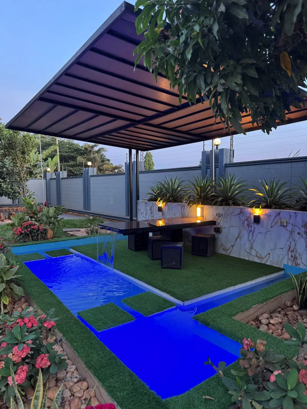 Fountain at night blue, Home remodel, fountain and landscaping, Jinja