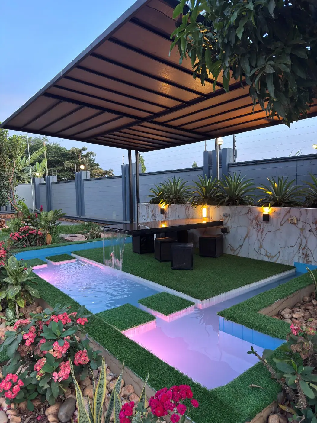 Home remodel, fountain and landscaping, Jinja