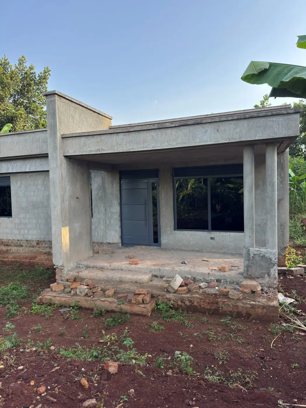 Site glazing installed, Modern family bungalow, Nakabango, Jinja