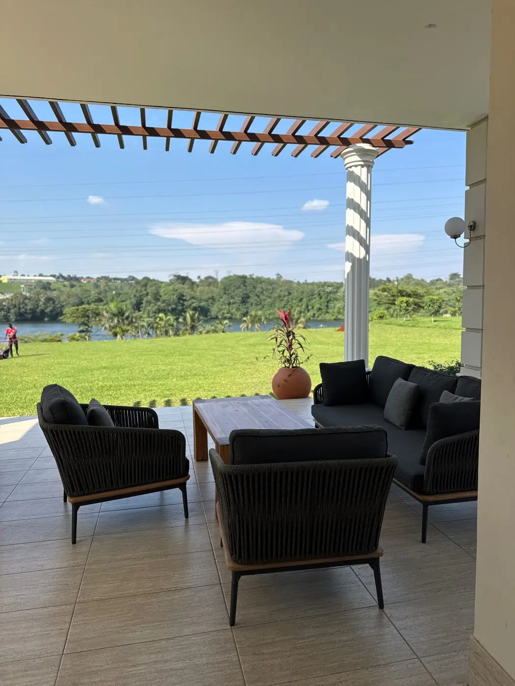 Veranda overlooking lawn, Luxury residence on the Nile, Njeru, Buikwe District